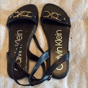 Calvin Klein Black Sandals with Gold Chain Detail